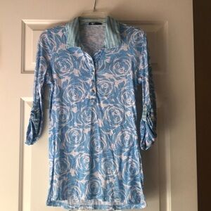 Tunic with snap closure